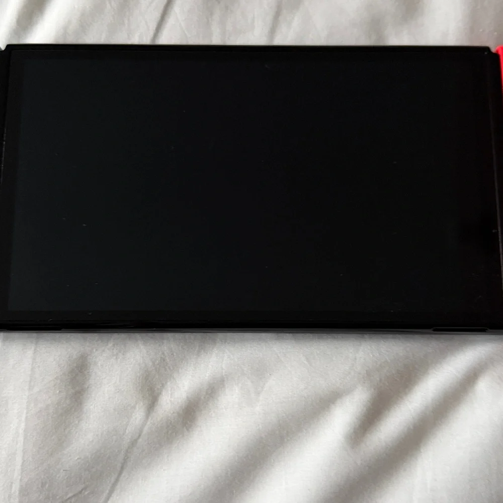Nintendo oled included with HDMI wire and usb charger
